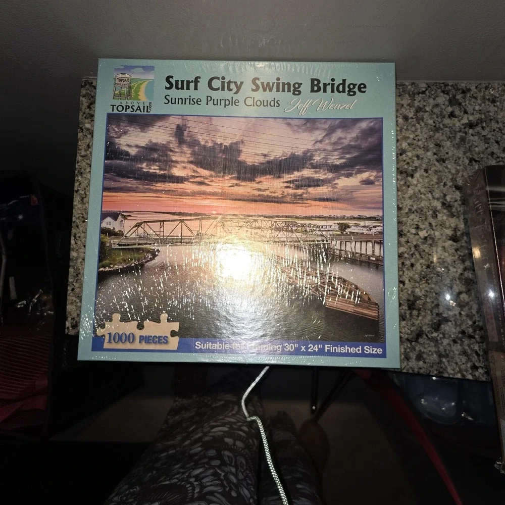 Above Topsail Surf City Swing Bridge 1000 Piece Puzzle Sunrise Purple Clouds